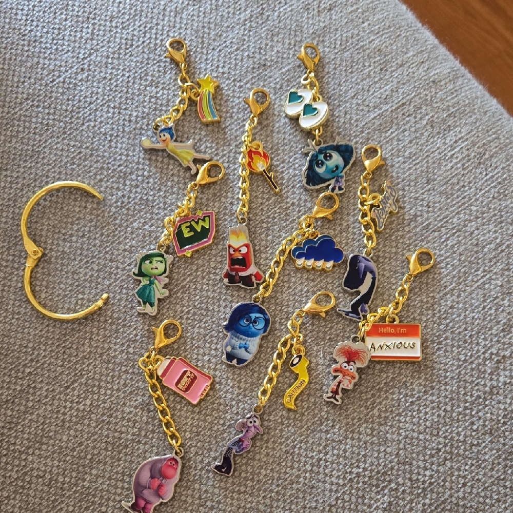 Mini Gold Keychains from Disneys Inside Out 2 Uber Eats Promo